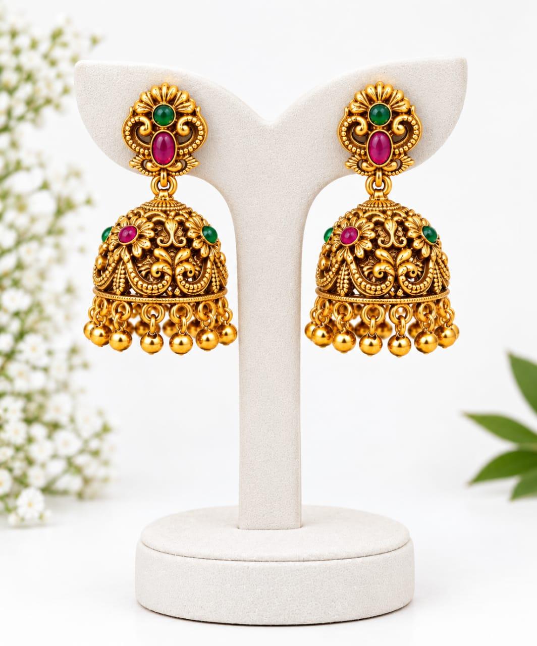 Antique round thilakam jhumka - pink and green stone earring Antique round thilakam jhumka - pink and green stone earring